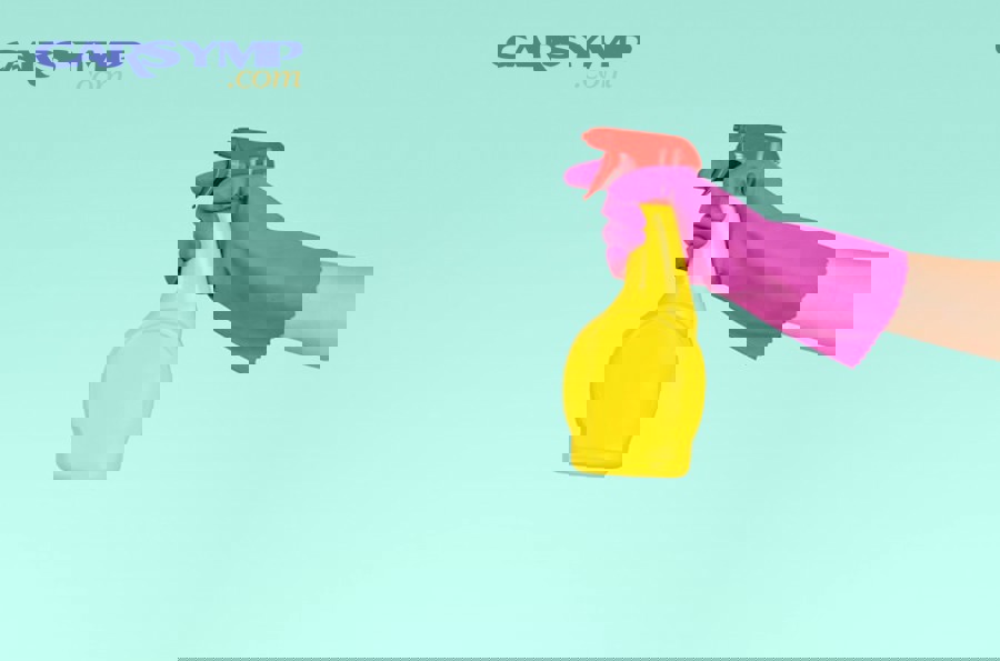 cleaning supplies including microfiber cloths and spray bottles