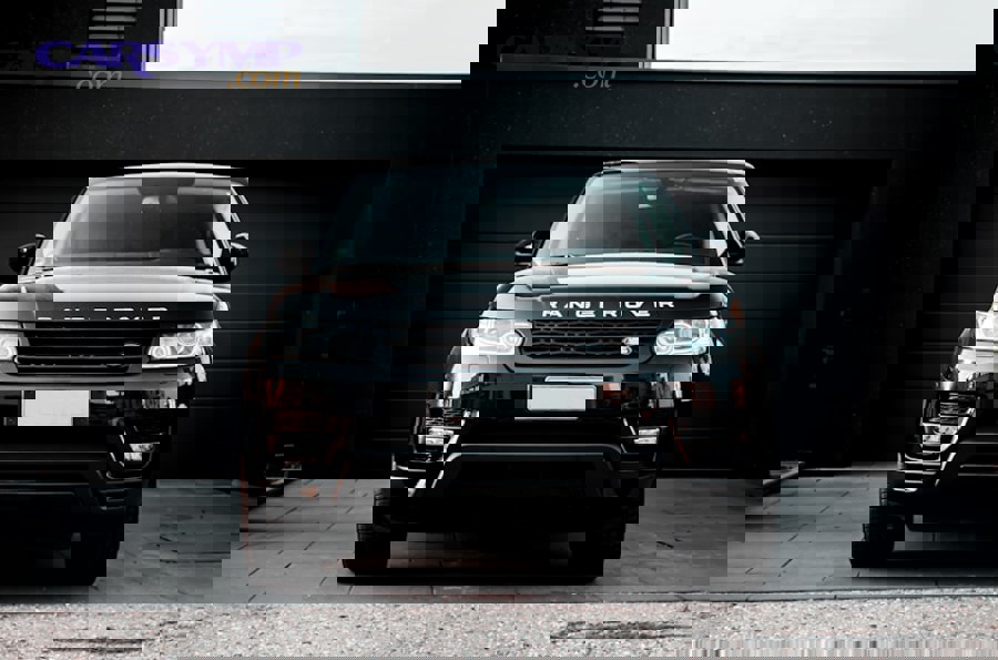 luxury car engine bay showing complex power steering system