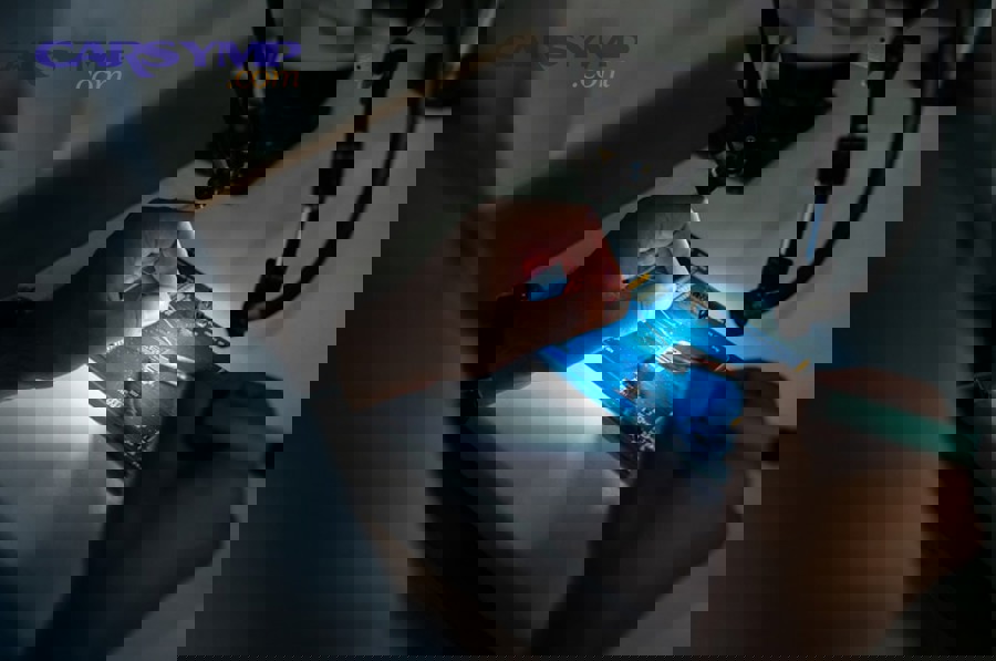 Application of anti-seize compound to wheel stud threads