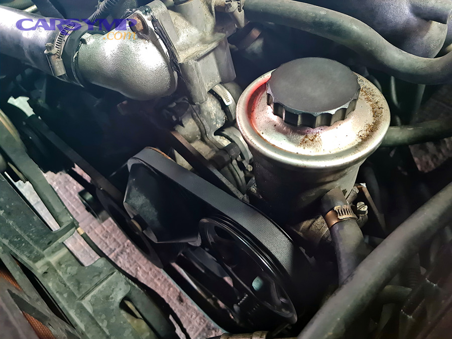 power steering components laid out for replacement