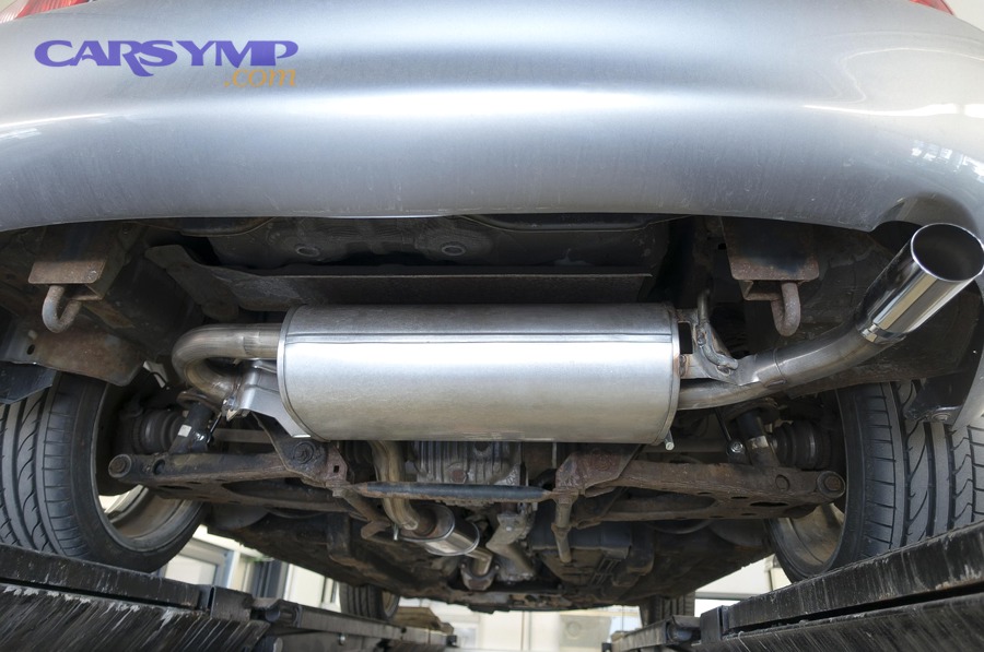 Underside view of a car exhaust system layout