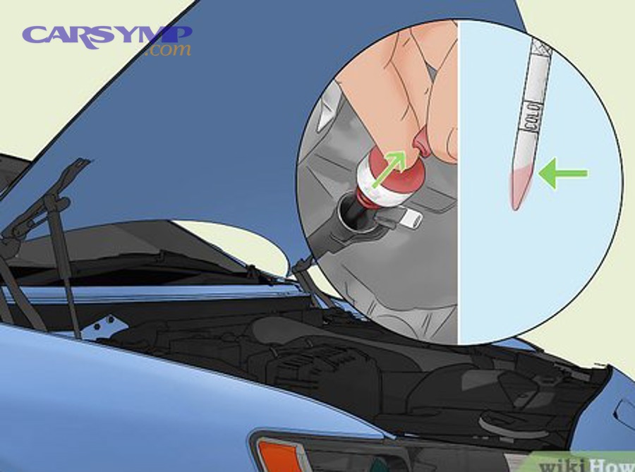 Transmission fluid dipstick being checked as part of low fluid confirmation