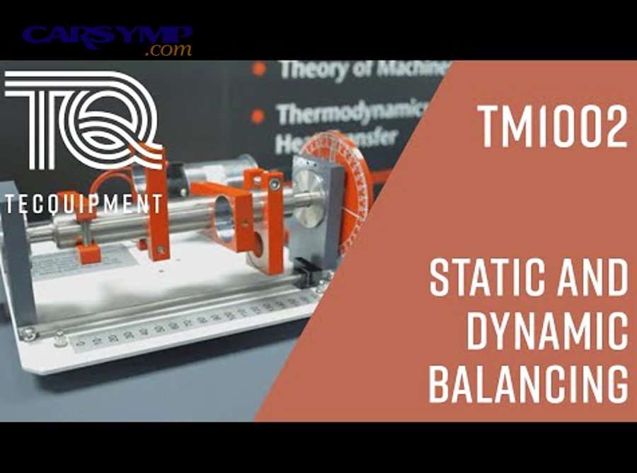 Car parked in a service bay for tire and wheel work