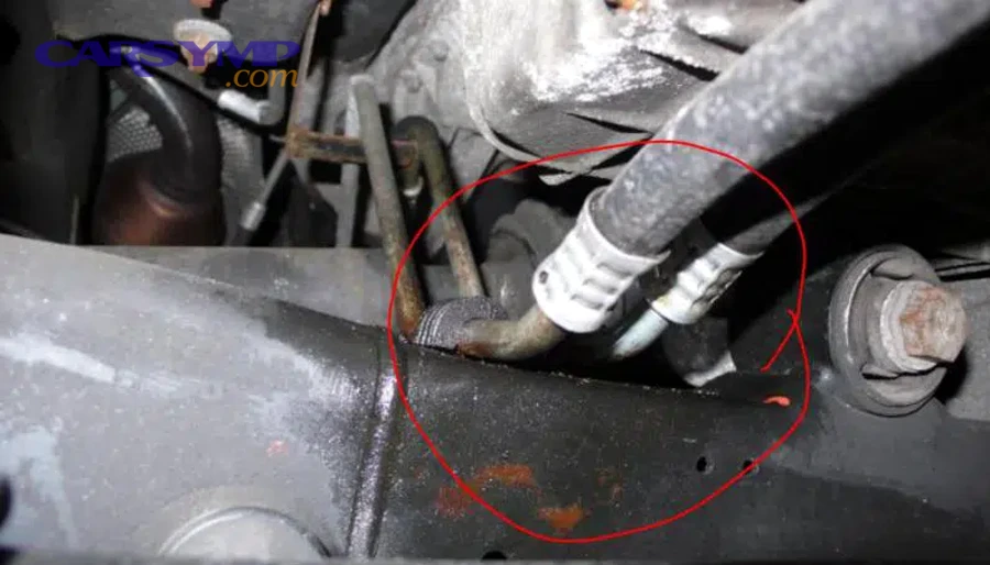 Transmission cooler lines connecting to radiator on a vehicle