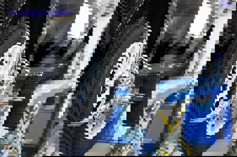 close view of car suspension and wheel for alignment discussion