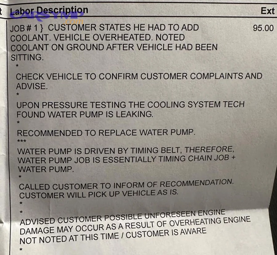 Car in service bay during cooling system inspection after repair