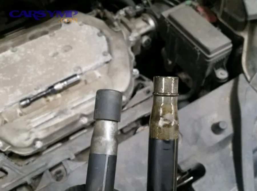 Automotive tools and cleaning supplies prepared for ignition coil and valve cover work