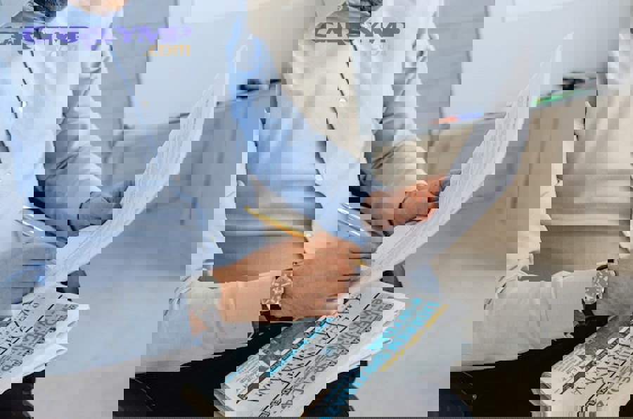 Auto repair technician inspecting a vehicle with tools and service equipment