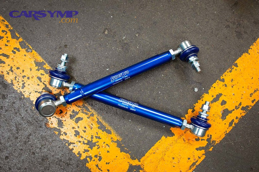 Automotive technician replacing suspension components showing proper repair procedures