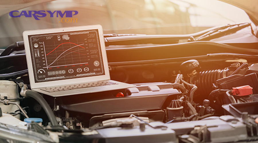 Driver holding steering wheel while diagnosing vibration at idle inside a car