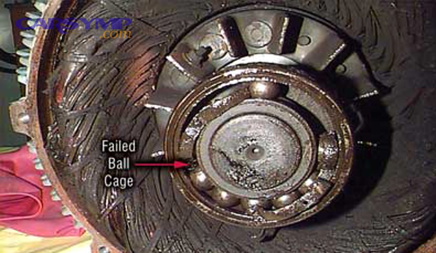 Driver inspecting a wheel area for signs of bearing noise or vibration