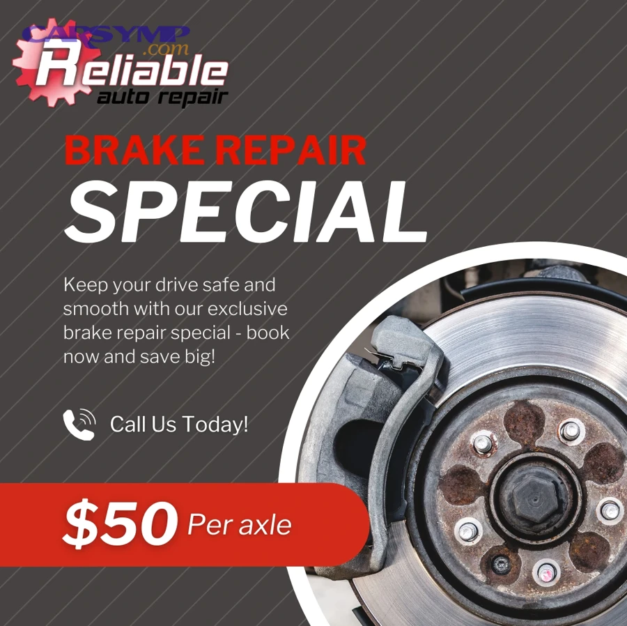 Customer reviewing written repair warranty terms at an auto shop counter