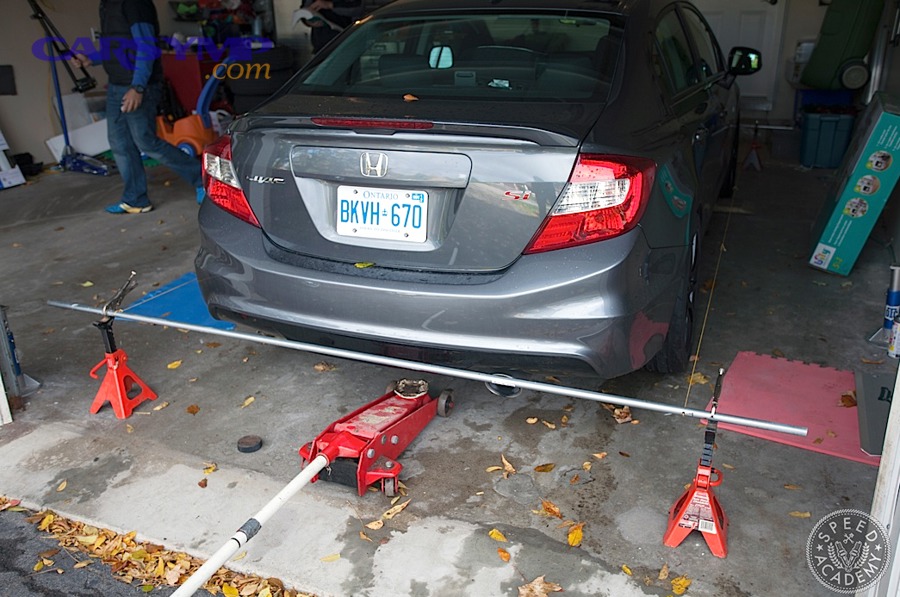 Car on road showing symptoms that may require wheel alignment