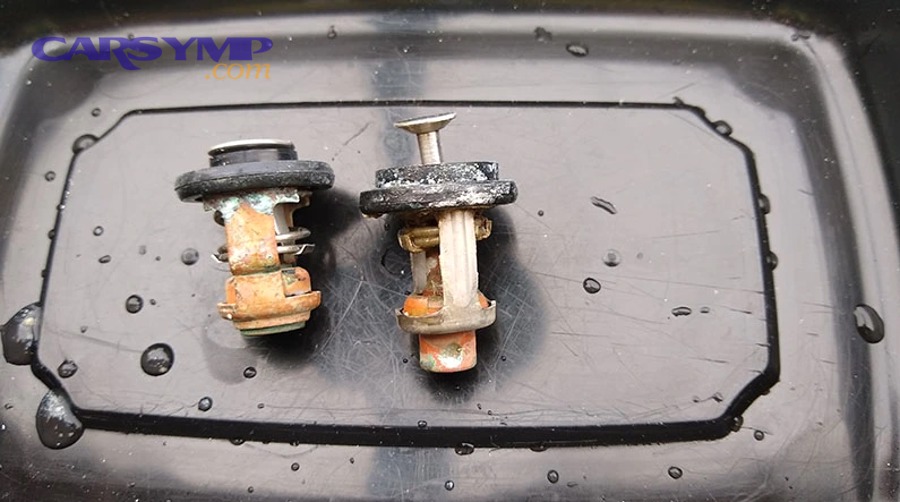 check engine light illuminated on car dashboard indicating diagnostic trouble code