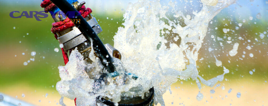 Detailed automobile engine view showing components that affect repair pricing