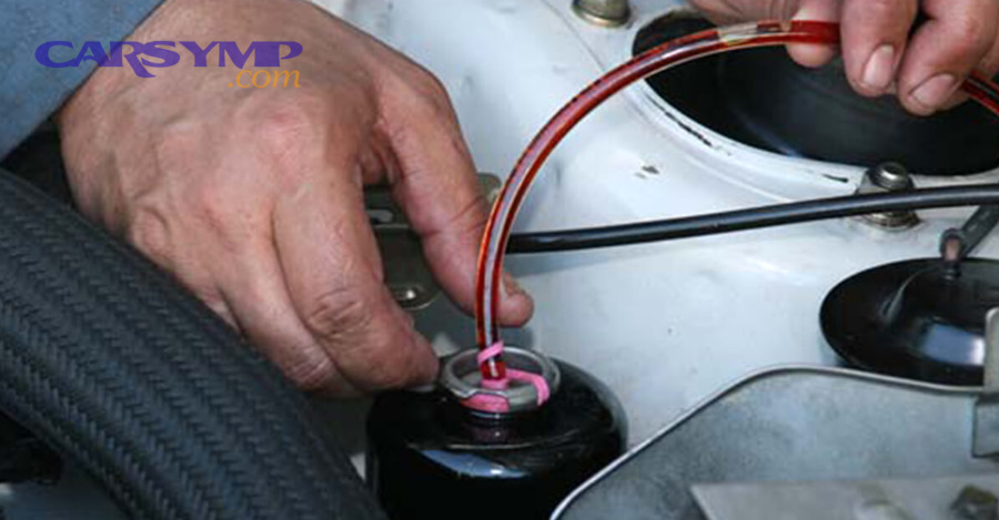 Checking power steering fluid level in reservoir