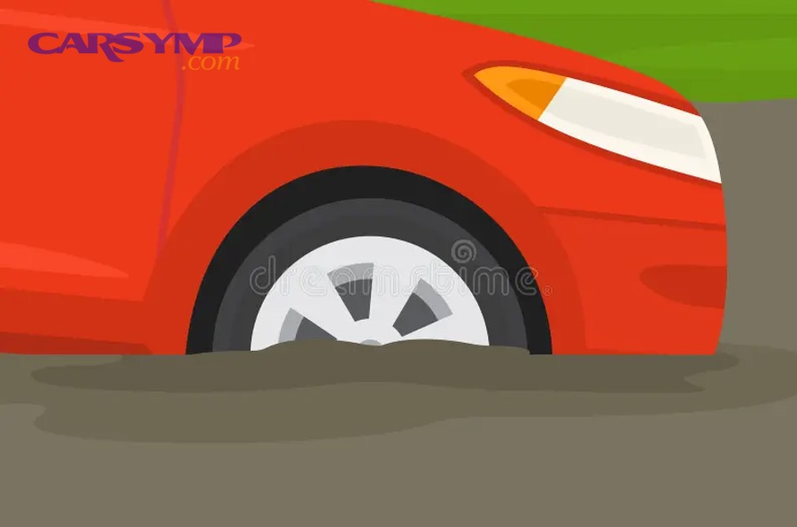 close up front tire red car which got stuck muddy road side view safe driving ru