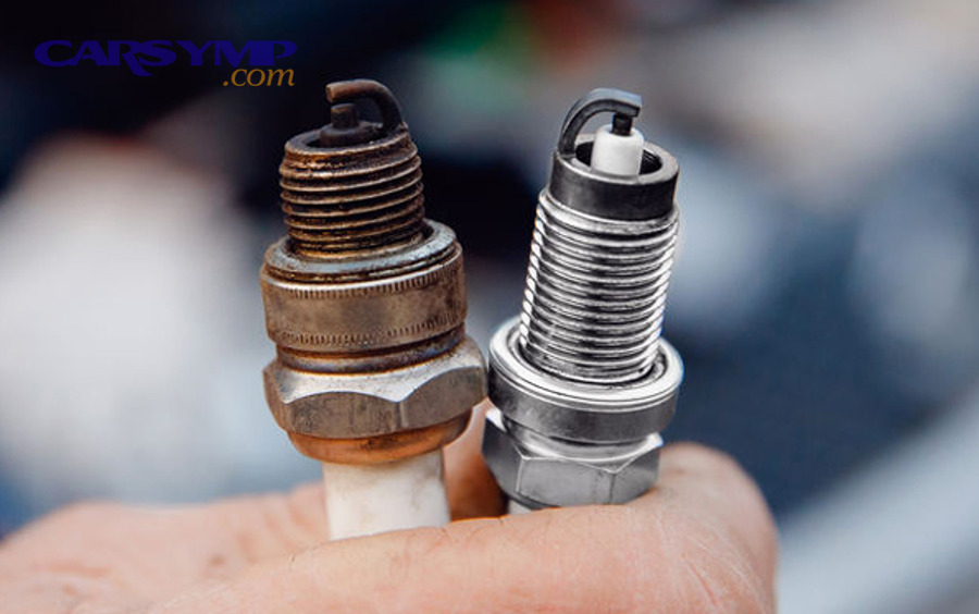Worn spark plug showing possible engine misfire symptoms