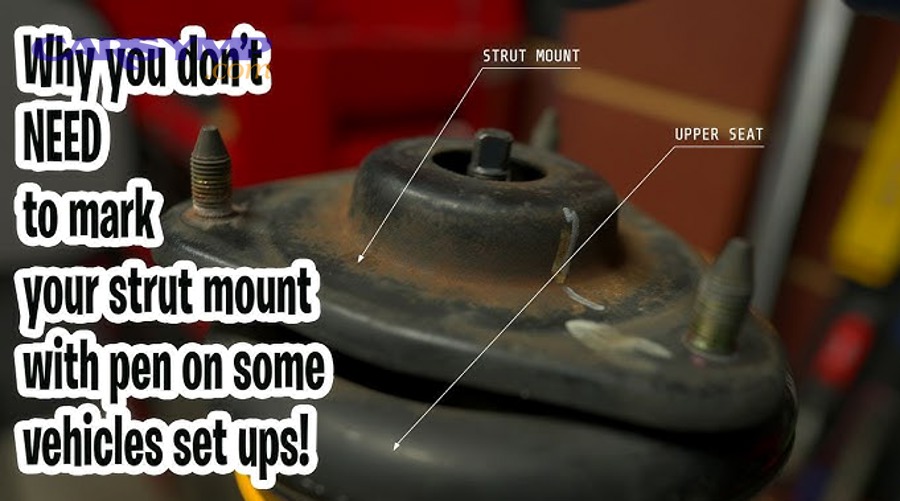 automotive technician assembling shock absorber components in correct sequence