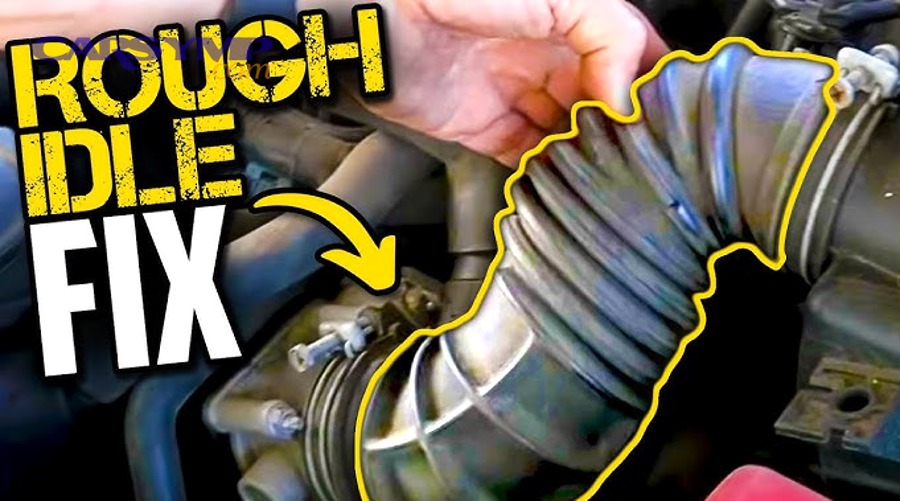 Mechanic inspecting engine mounts and powertrain movement during idle vibration diagnosis