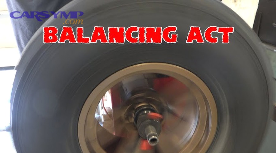 Automotive service area with balancing and tire equipment