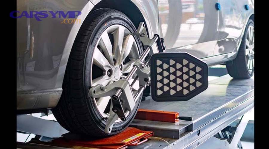 Wheel balancing machine in a tire service shop