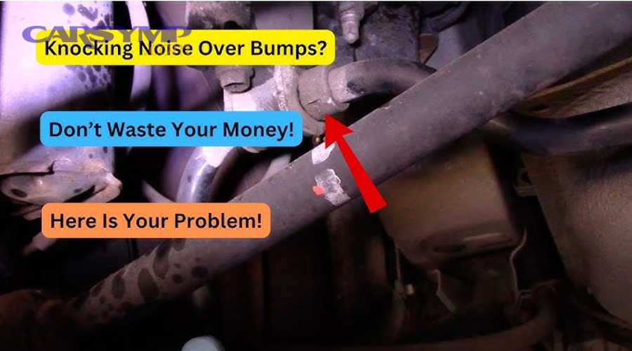 mechanic inspecting car suspension components from underneath vehicle on lift