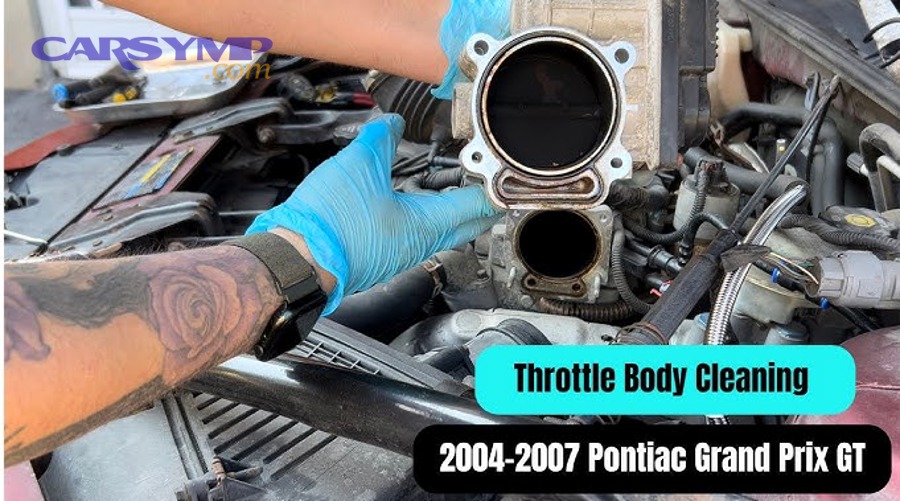 mechanic using torque wrench on engine bolts during reassembly