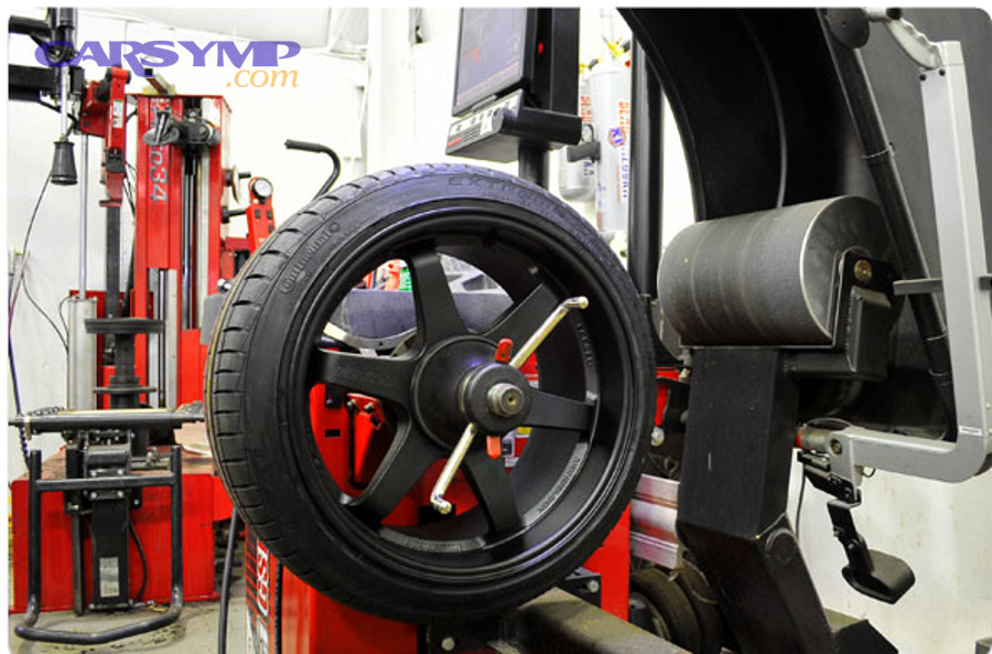 Performance car with large low-profile tires