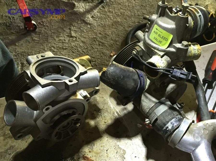 Automotive thermostat prepared for replacement