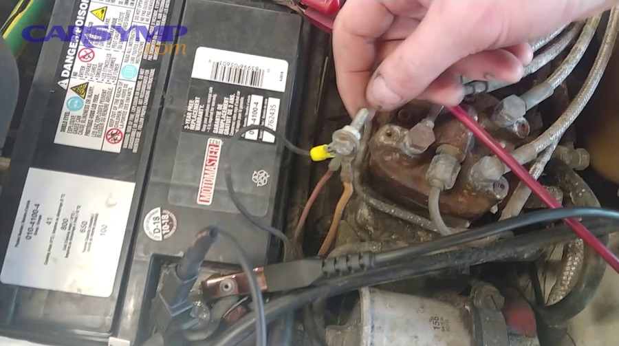Corroded ground cable showing green oxidation and damaged copper strands