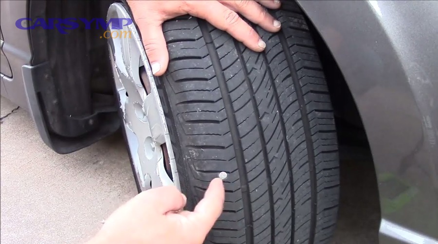 Tire valve stem cross section showing potential slow leak point after repair