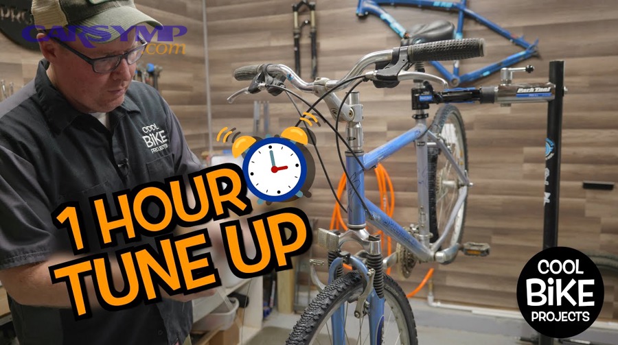 Basic car maintenance tools laid out for a beginner tune-up
