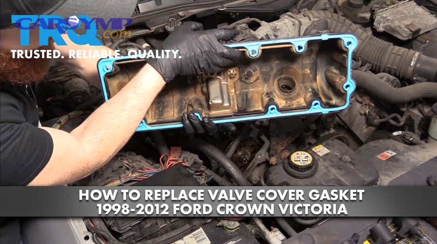 Torque wrench and engine components prepared for valve cover gasket replacement and inspection