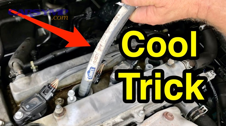 Step-by-step ignition coil cleaning process near spark plug wells