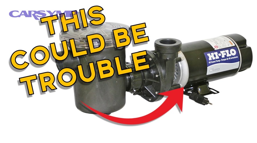 Mechanic diagnosing front engine accessory noise with listening tool