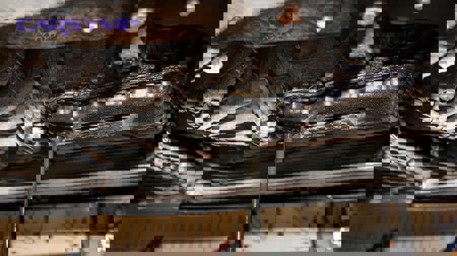 Transmission pan and filter disassembled for replacement during service