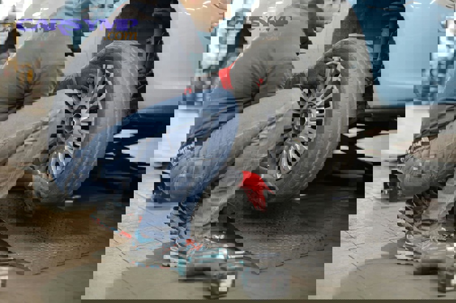 Driver responding to overheating warning and scheduling vehicle inspection