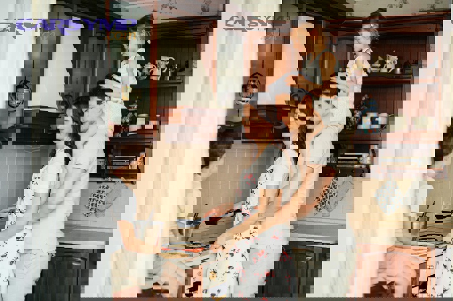 Driver checking engine area for coolant leak and overheating signs