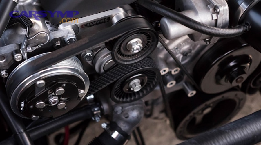 mechanic inspecting brake components before service
