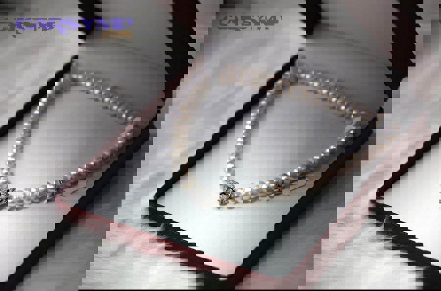 delicate jewelry chain being cleaned gently