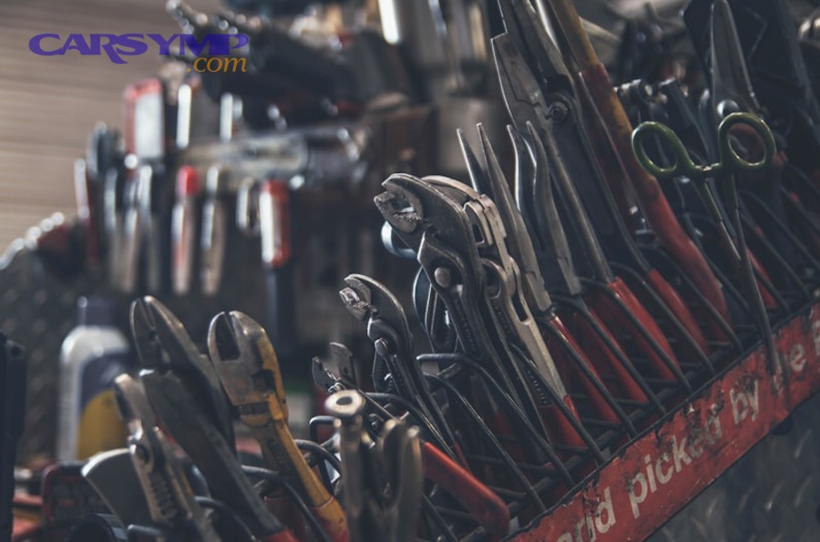 automotive multimeter and testing tools on workbench