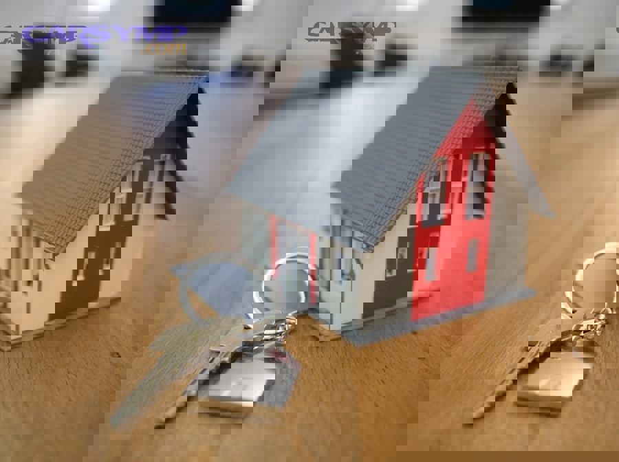 homeowner reviewing construction estimate documents with calculator and blueprints on desk