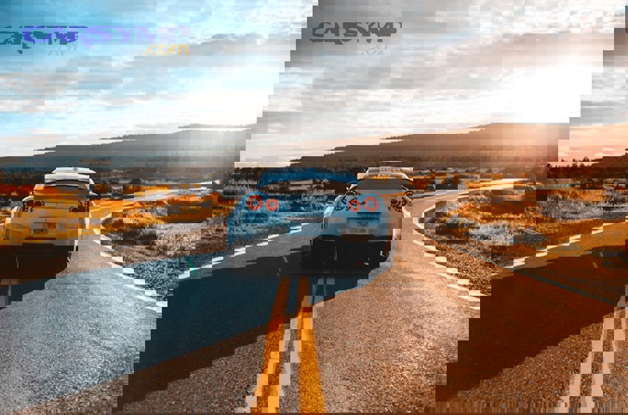 BMW M3 on track showing performance suspension during aggressive cornering