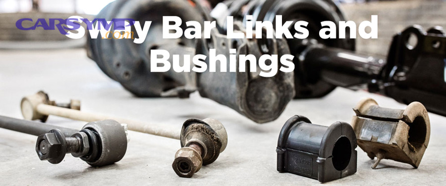 Mechanic's hands inspecting sway bar link for play and wear