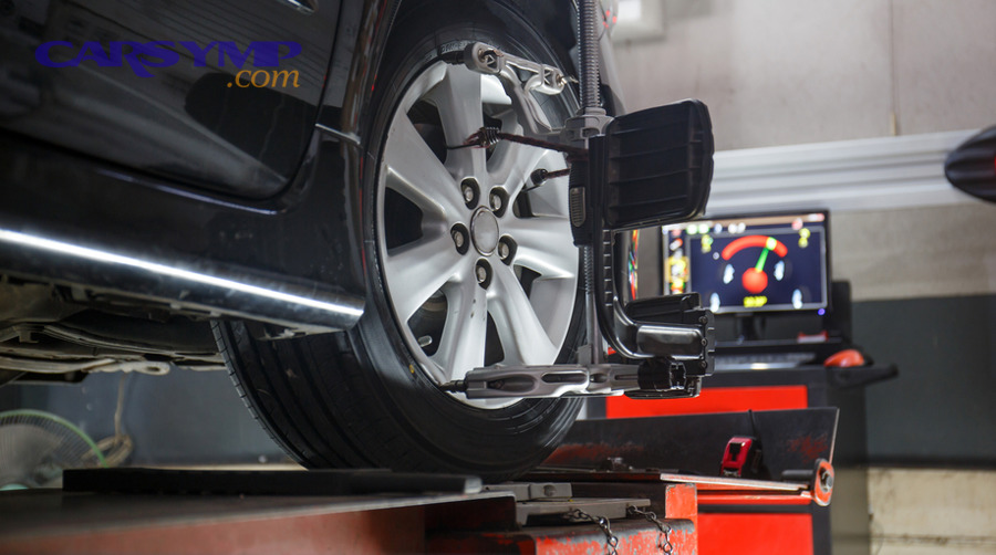 Road pothole that can trigger wheel alignment symptoms